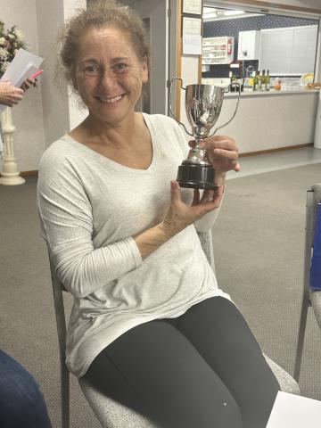 Jen Elgar holding her award.