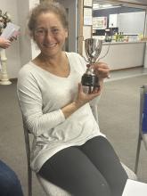 Jen Elgar holding her award.